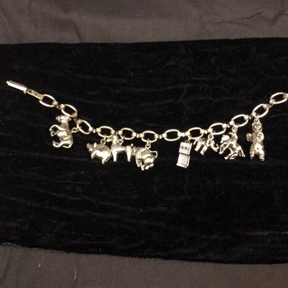 Silver tone charm bracelet